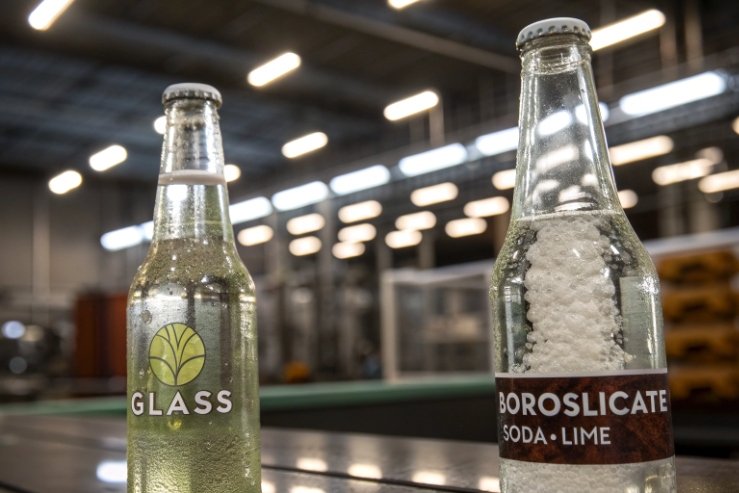Two glass bottles in factory, comparing borosilicate and soda-lime glass materials.