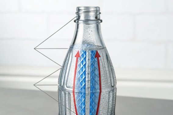 Cutaway diagram of textured glass bottle showing airflow channels and condensation control