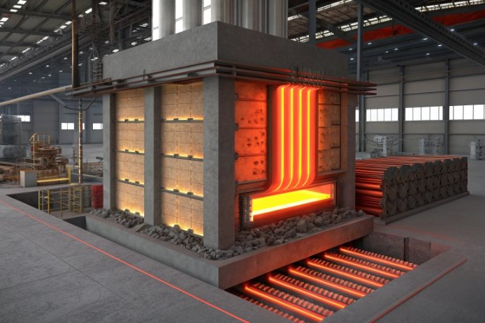Industrial furnace line with glowing heating elements inside factory workshop