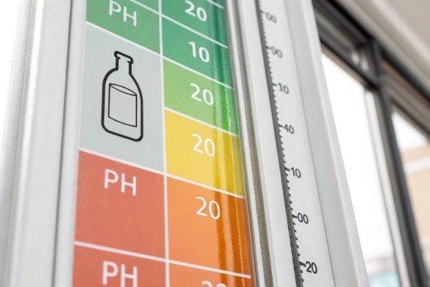 pH Scale Label pH scale label closeup with bottle icon and measurement strip for acid resistance