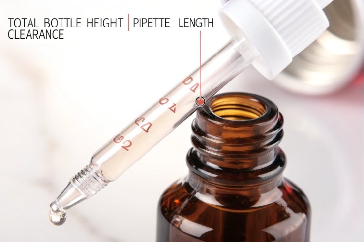Pipette length check Close up calibrated glass pipette dropper measuring total bottle height and clearance