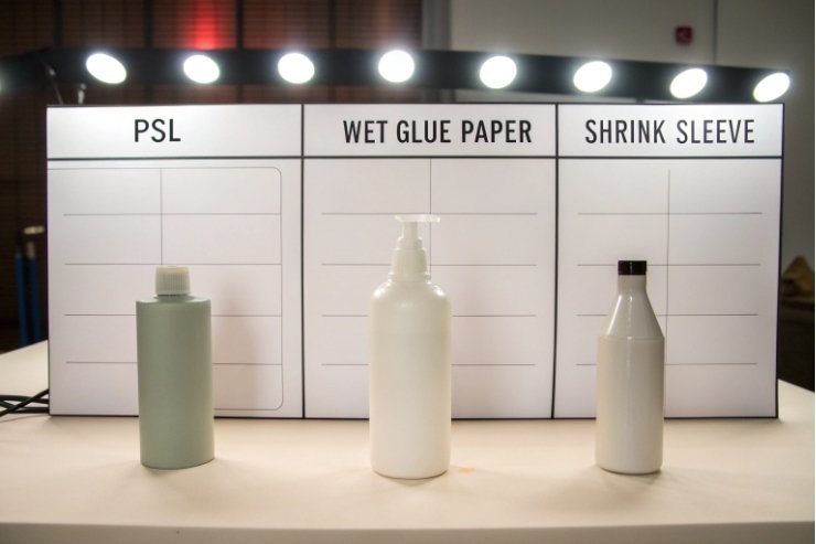 Packaging label comparison setup for PSL wet glue paper and shrink sleeve bottles