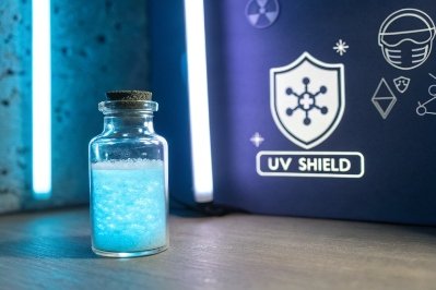 UV shield concept with glowing glass vial representing protective coating technology