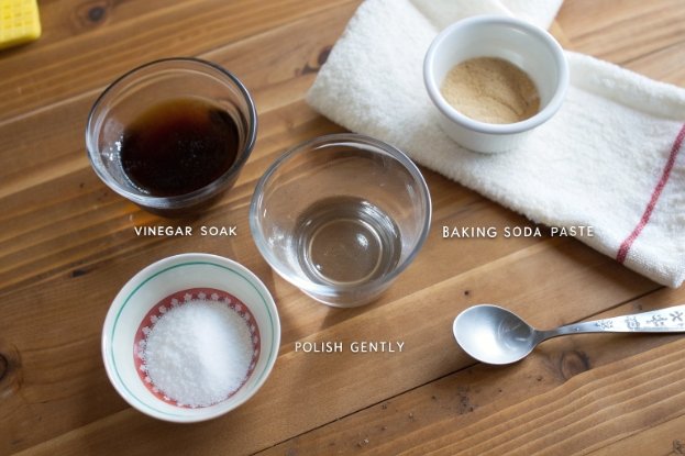 Vinegar soak, baking soda paste, and salt for polishing dishes
